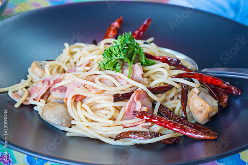 Spaghetti Ham and mushrooms, a traditional Italian recipe photo