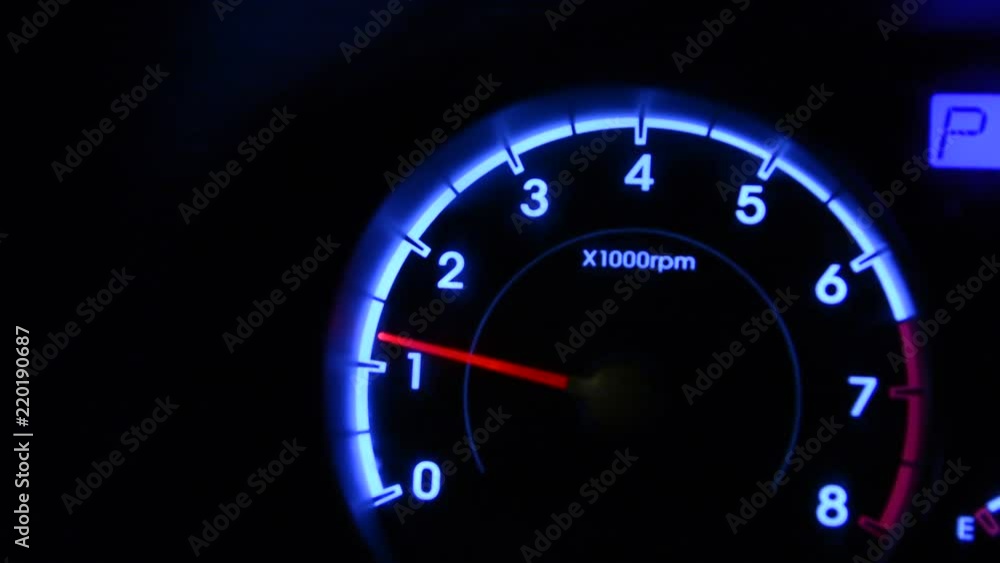 Engine start, arrow moves up tachometer dashboard close up Engine start, arrow moves up tachometer dashboard close up