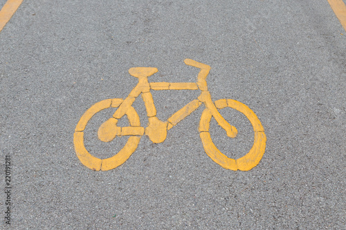 Bike lanes and yellow bike symbol, Bike alley in public park