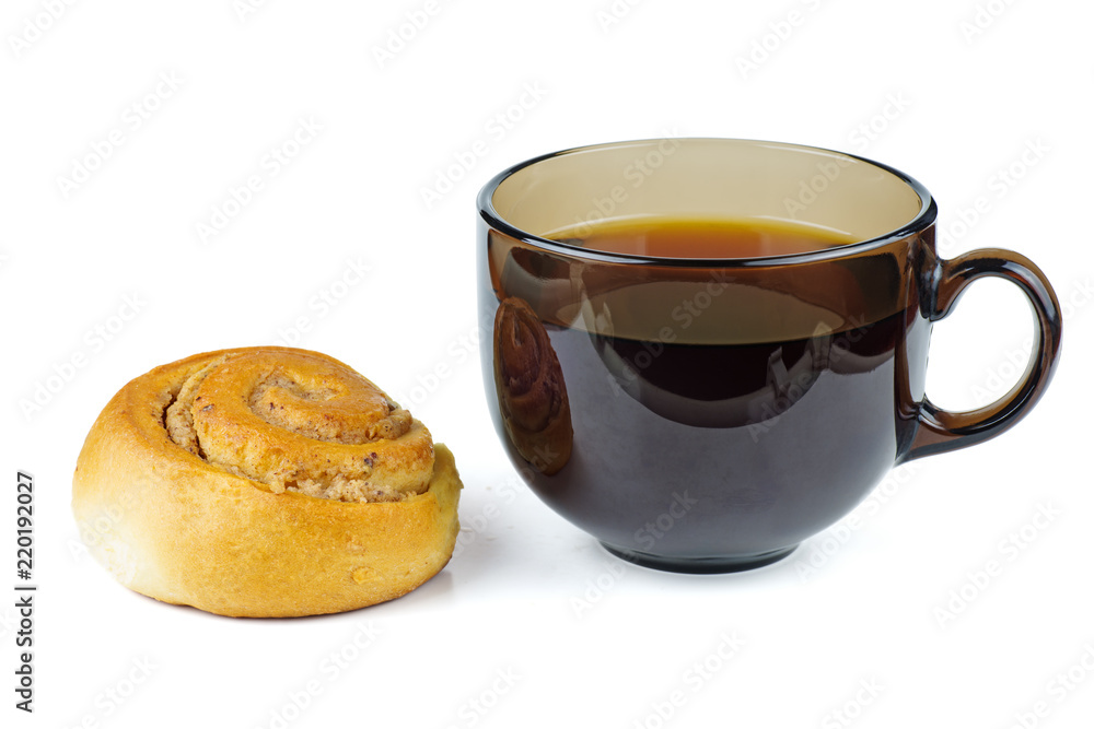 Sweet homemade cinnamon roll and cup of tea isolated on white background Sweet homemade cinnamon roll and cup of tea isolated on white background