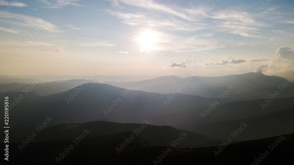 Sunset in the mountains with a bird's eye view