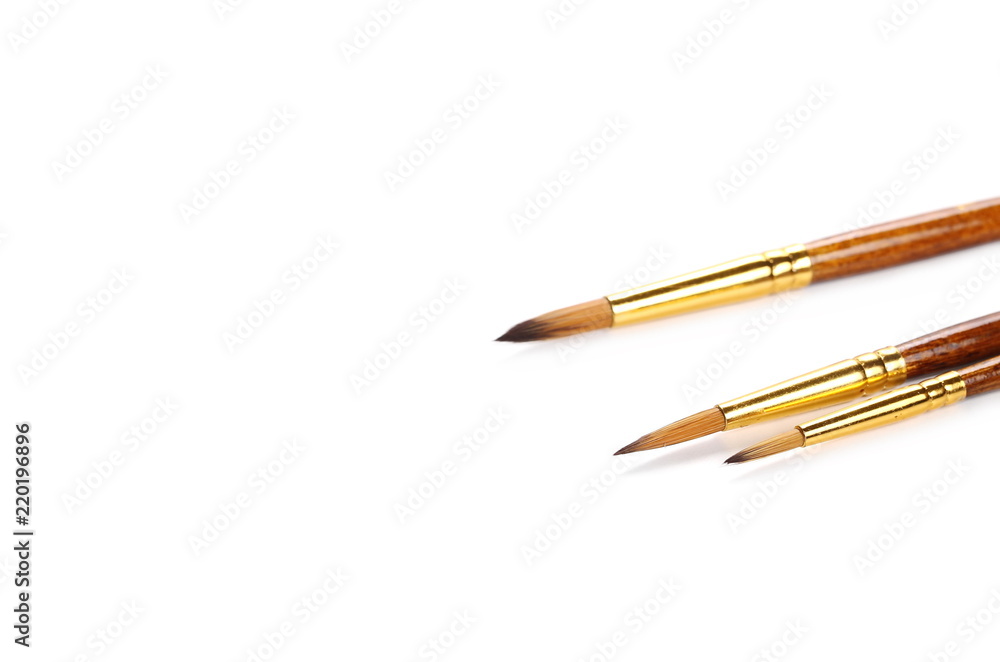 New paintbrushes isolated on white background New paintbrushes isolated on white background