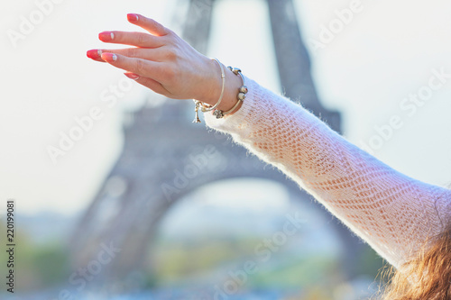 Photography Woman near the Eiffel tower in Paris, France