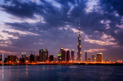 Beautiful night dubai downtown skyline. Fastinaciting reflection of skyscrapers in Business Bay area, Dubai, United Arab Emirates