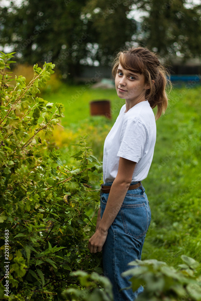 girl walking in the garden girl walking in the garden