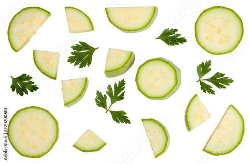 Sliced of zucchini isolated on white, top view. photo