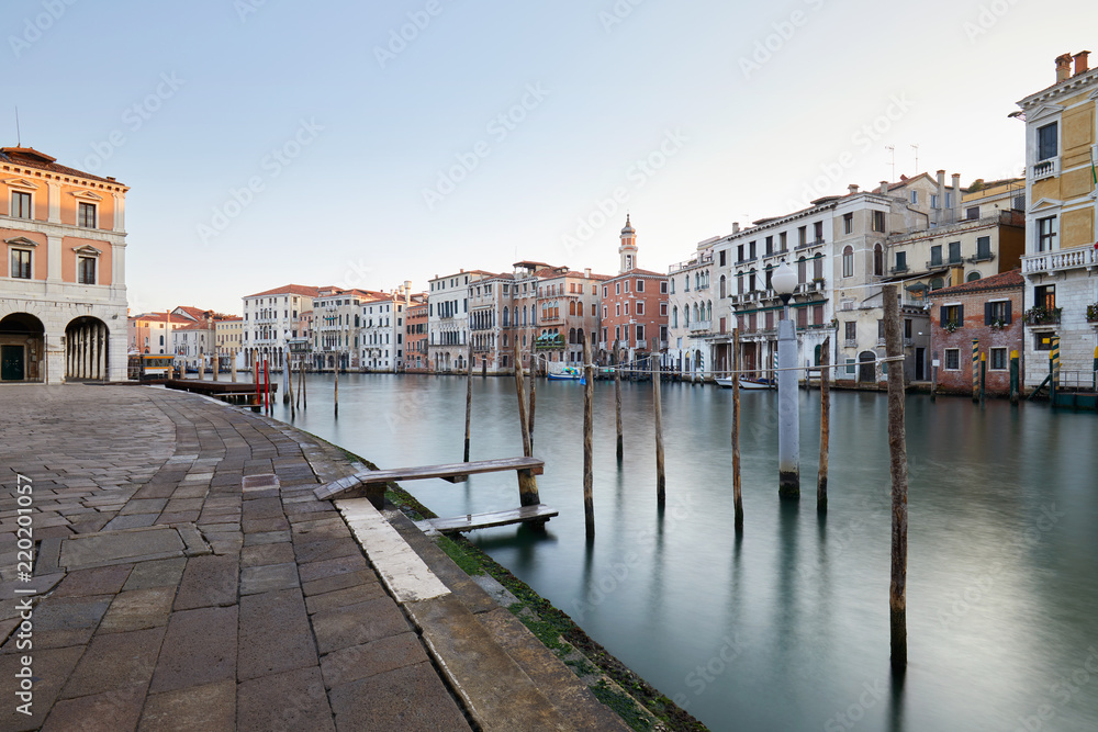 Grand Canal in Venice and docks, nobody in the early morning in Italy
