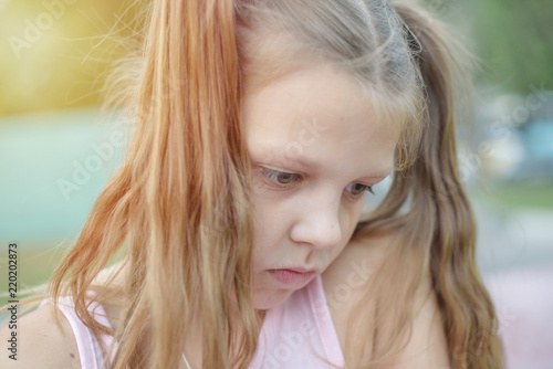 portrait of a sad little girl