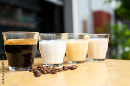 Close-up how to make ice latte coffee, the ingredients espresso and milk