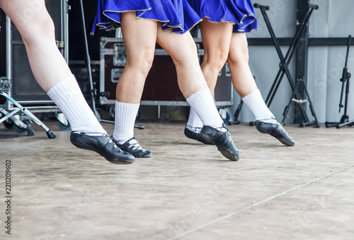 female legs of three irish dancers