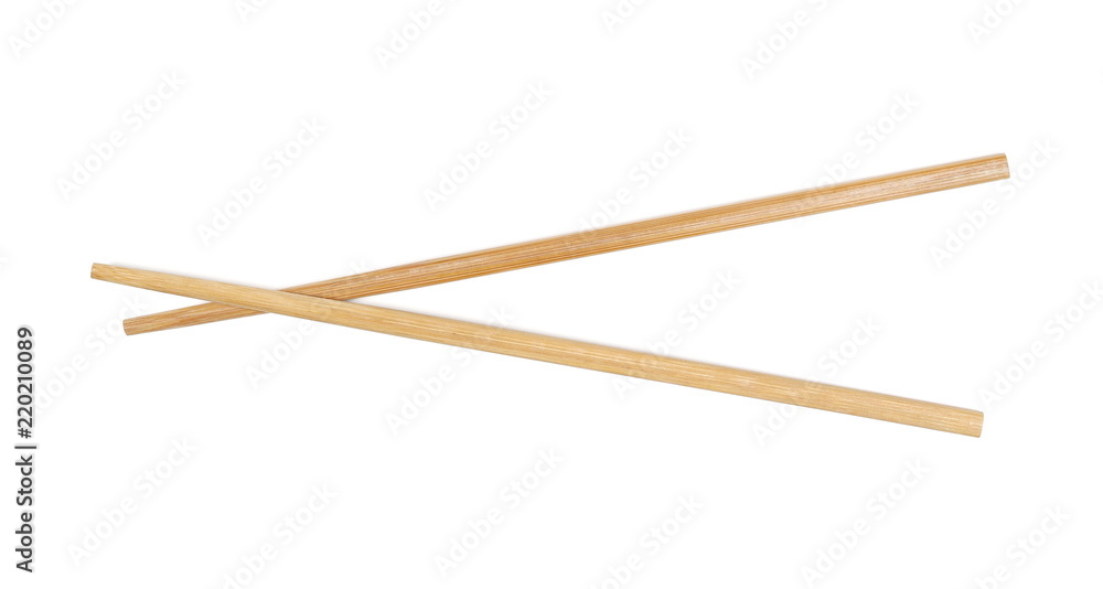 Asian wooden chopsticks isolated on white background, top view Asian wooden chopsticks isolated on white background, top view