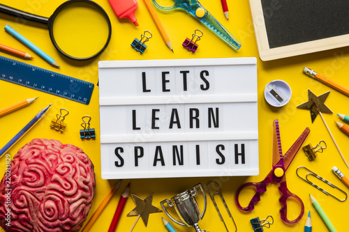 Lets learn spanish lightbox message on a bright yellow background