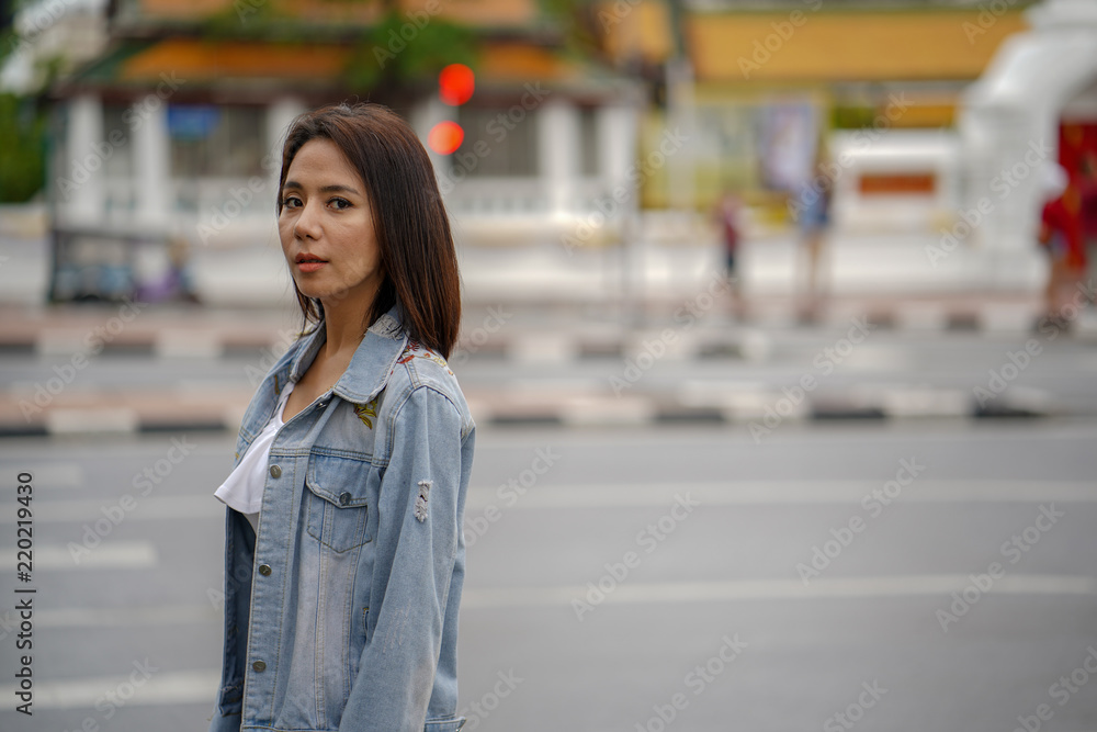 Young asian woman traveling to landmark in Bangkok Thailand.