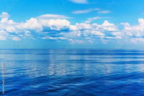 Blue sea or ocean and sky with clouds © Scanrail