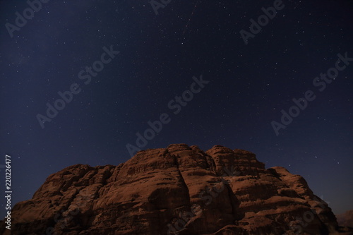 Mountains of Wadi Rum desert at night, Jordan © AnastasiiaUsoltceva