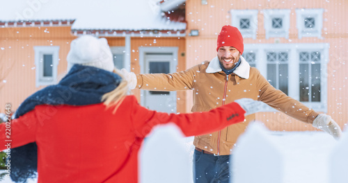 Canvastavla Handsome Young Man Meets His Fiance Coming Home, they Embrace Happily, Snow Falls on them