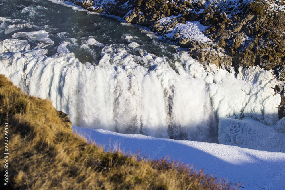 The amazing show of the Gulfoss waterfall during winter time. Gulfoss is located in the canyon of Hvítá river in southwest Iceland. The amazing show of the Gulfoss waterfall during winter time. Gulfoss is located in the canyon of Hvítá river in southwest Iceland.