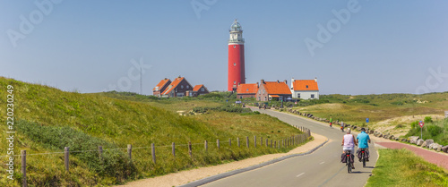 Panorama of a couple on bicycles on Texel Island, Netherlands