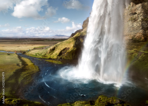 view of the waterfall of Iceland, tourists, screensaver.