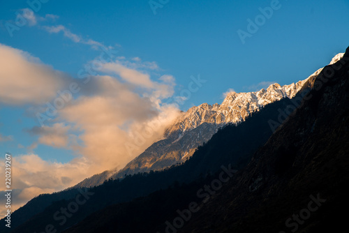Crop view mountain peak warm color by sunlight