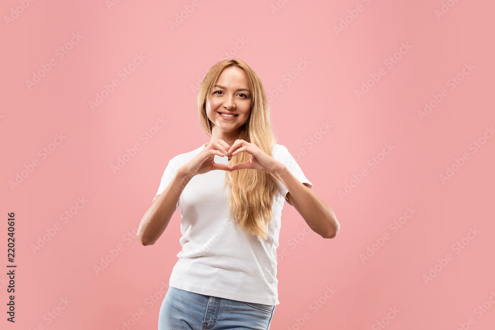 I kiss you. Portrait of attractive woman with kiss on lips. Pink studio. Beautiful female portrait. Young happy emotional funny woman looking at camera. Human facial emotions concept. Trendy colors I kiss you. Portrait of attractive woman with kiss on lips. Pink studio. Beautiful female portrait. Young happy emotional funny woman looking at camera. Human facial emotions concept. Trendy colors