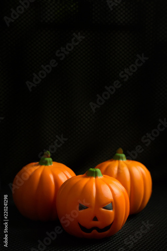 The halloween pumpkin jack in black holiday background image.