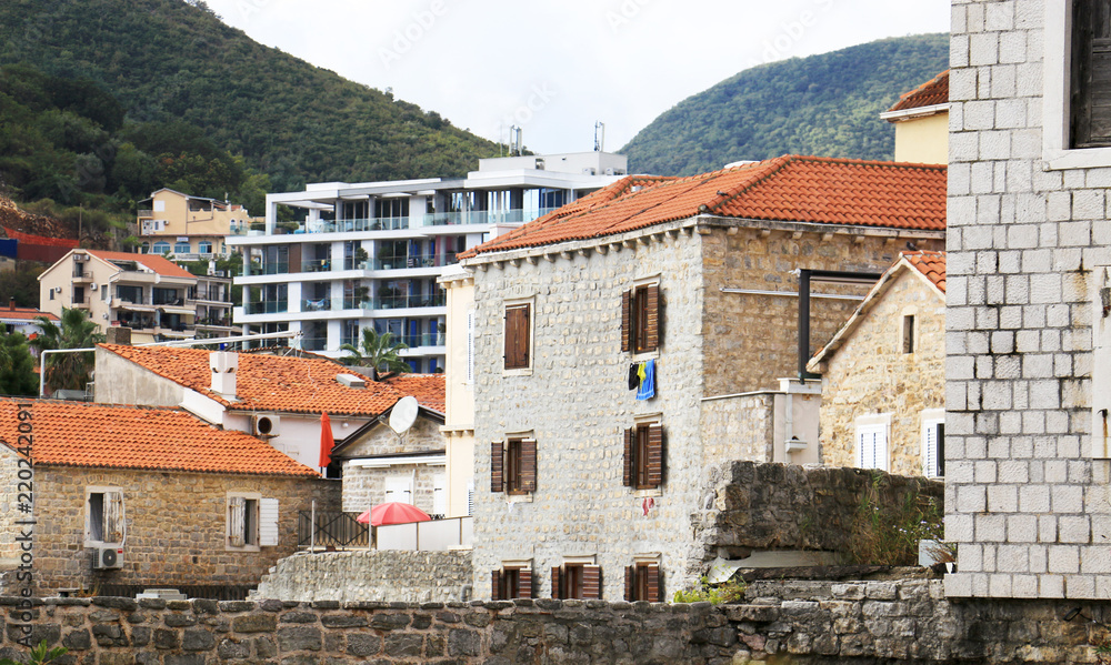 Budva old town. Historic streets, old houses and St. John's Church square. Montenegro, 2018.