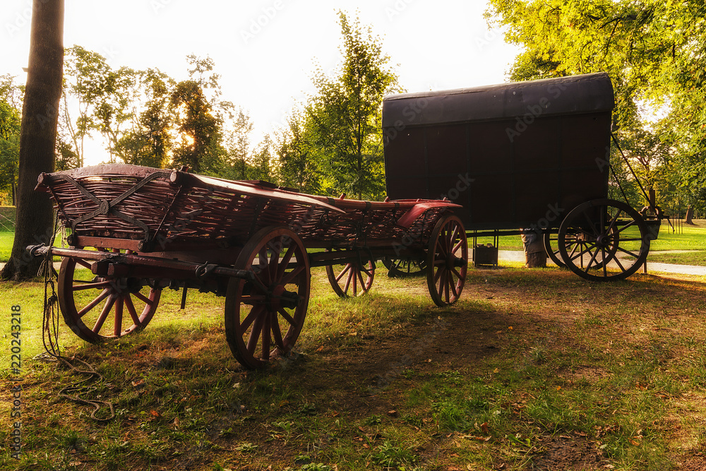 Two Chuck Wagons in the Garden of Wilanow Park