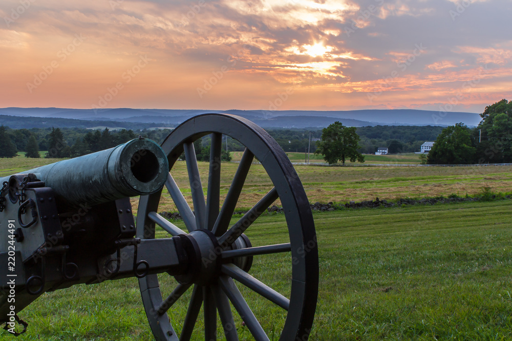 A cannon at Gettysburg, part of the National Park Service, at sunset