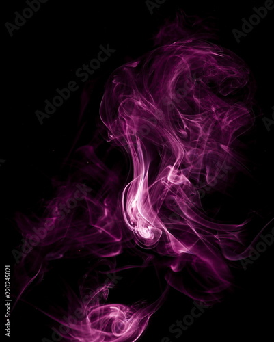 Purple smoke on black background