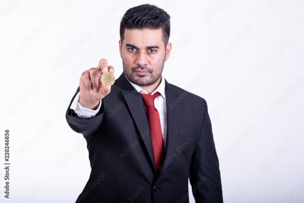 Businessman holding golden bitcoin isolated. Businessman holding golden bitcoin isolated.