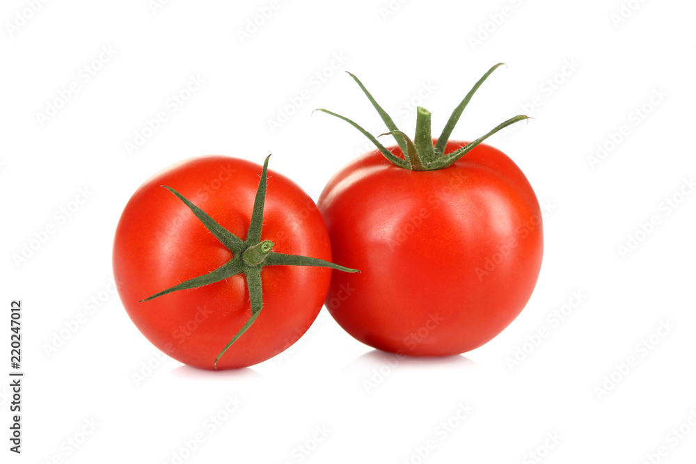 Zwei Tomaten auf weisser Unterlage Zwei Tomaten auf weisser Unterlage
