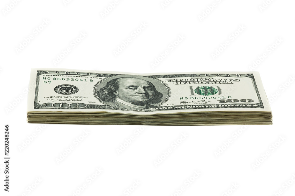 A small stack of one hundred dollar bills on a white background. A small stack of one hundred dollar bills on a white background.