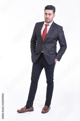 Businessman isolated in white background.