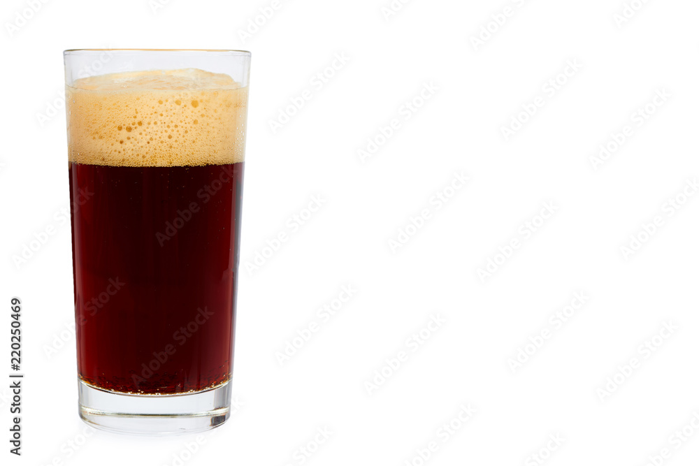 Cold glass of dark beer or kvass with foam isolated on white background, copy space template. Cold glass of dark beer or kvass with foam isolated on white background, copy space template.