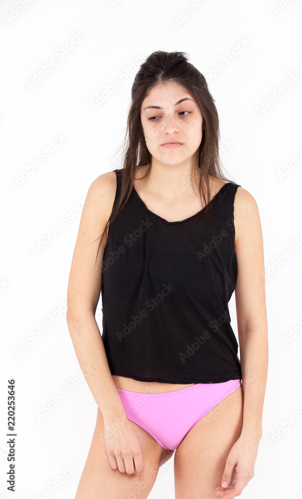 Contempt emotional girl on a light background Contempt emotional girl on a light background