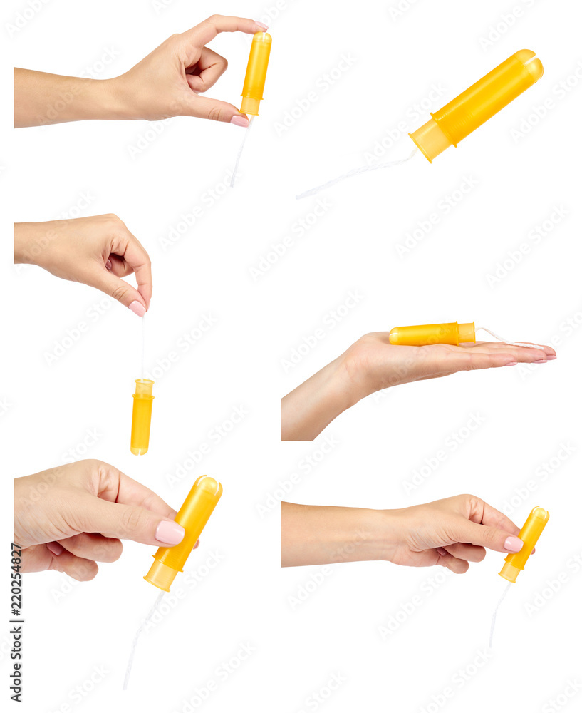 set of different clean cotton tampon in case with hand isolated on white background set of different clean cotton tampon in case with hand isolated on white background