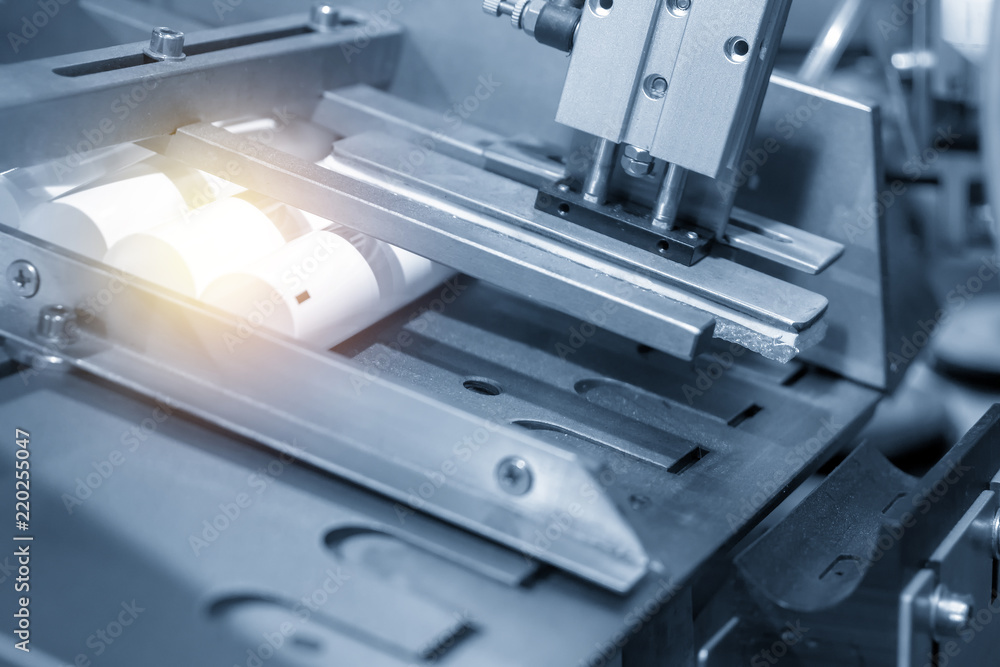 The toothpaste tube manufacturing process with the production machine .The hi-technology for modern manufacturing process. The toothpaste tube manufacturing process with the production machine .The hi-technology for modern manufacturing process.