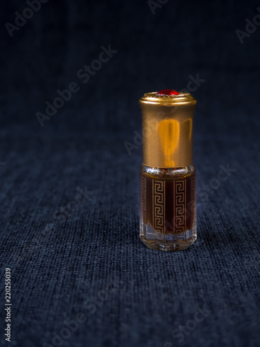 Arabian oud attar perfume or agarwood oil fragrances in mini bottles. 