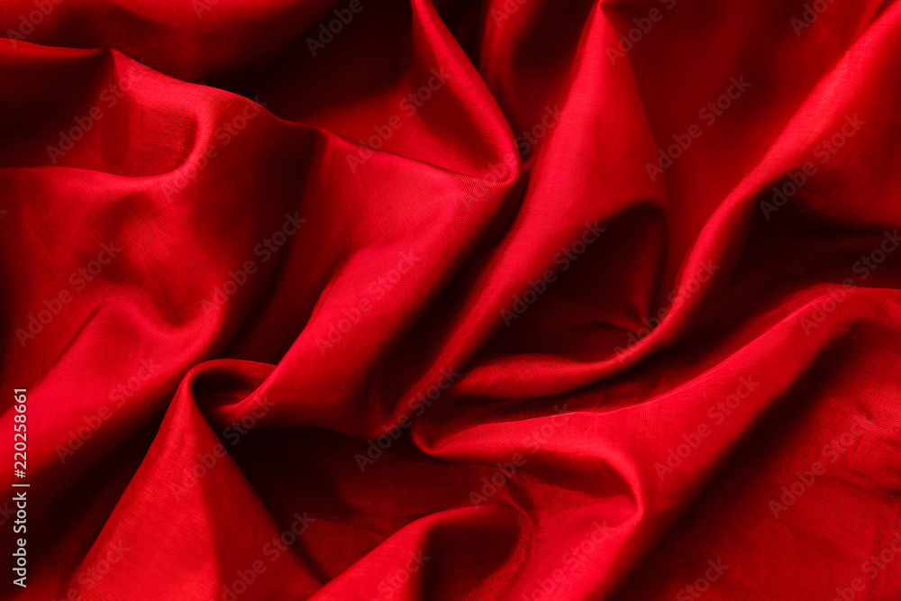 red fabric with folds background red fabric with folds background