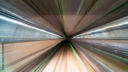 Blurred image of Subway tunnel with Motion blur of a monorail Train futures of transport in modern city