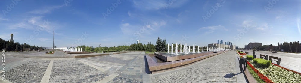 Moscow city skyline panorama Poklonnaya park field sky with monument of victory in great patriotic war background park street exterior panoramic detail wide travel tourism view