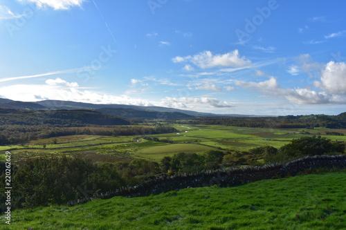 View into a valley full of fields