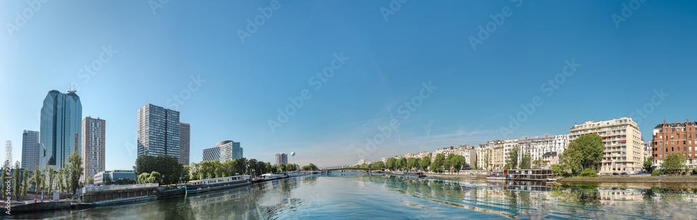 Panorama of modern district of skyscrapers on Seine river in Paris, France