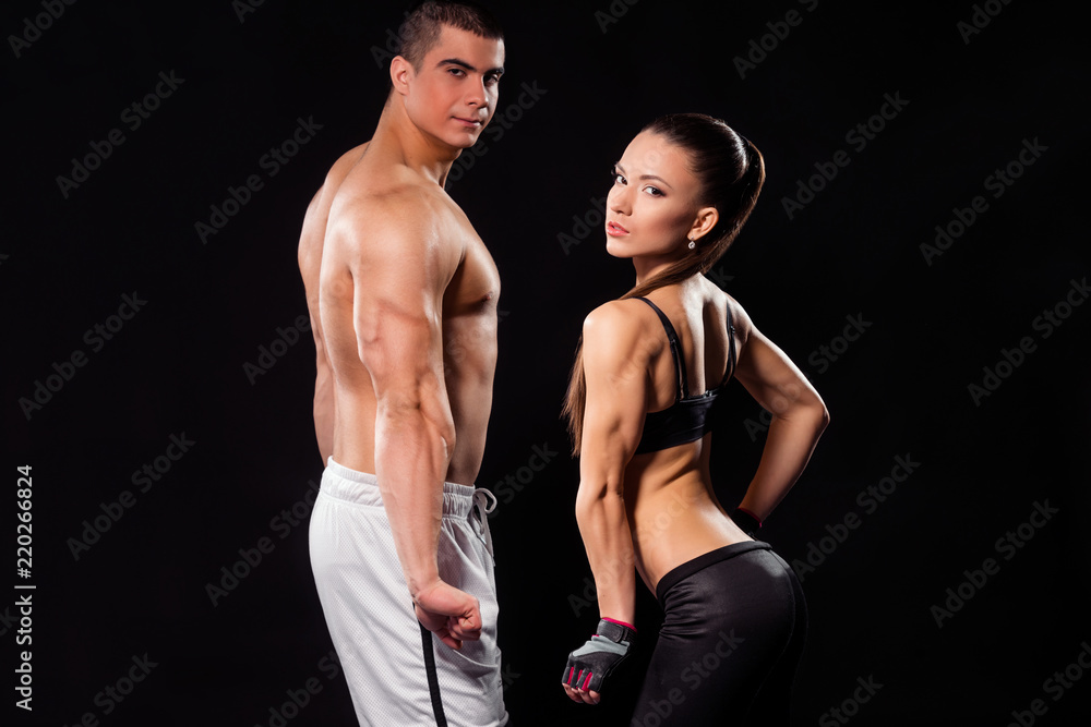 Guy and girl flex tricep.