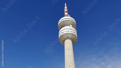 Tilts up to top of Snezhanka Tower. Snezhanka a 156 meter high tower with an observation deck near Pamporovo, Bulgaria. Tower situated on Snezhanka Peak at 1928 m above sea level and has a cafe with p photo