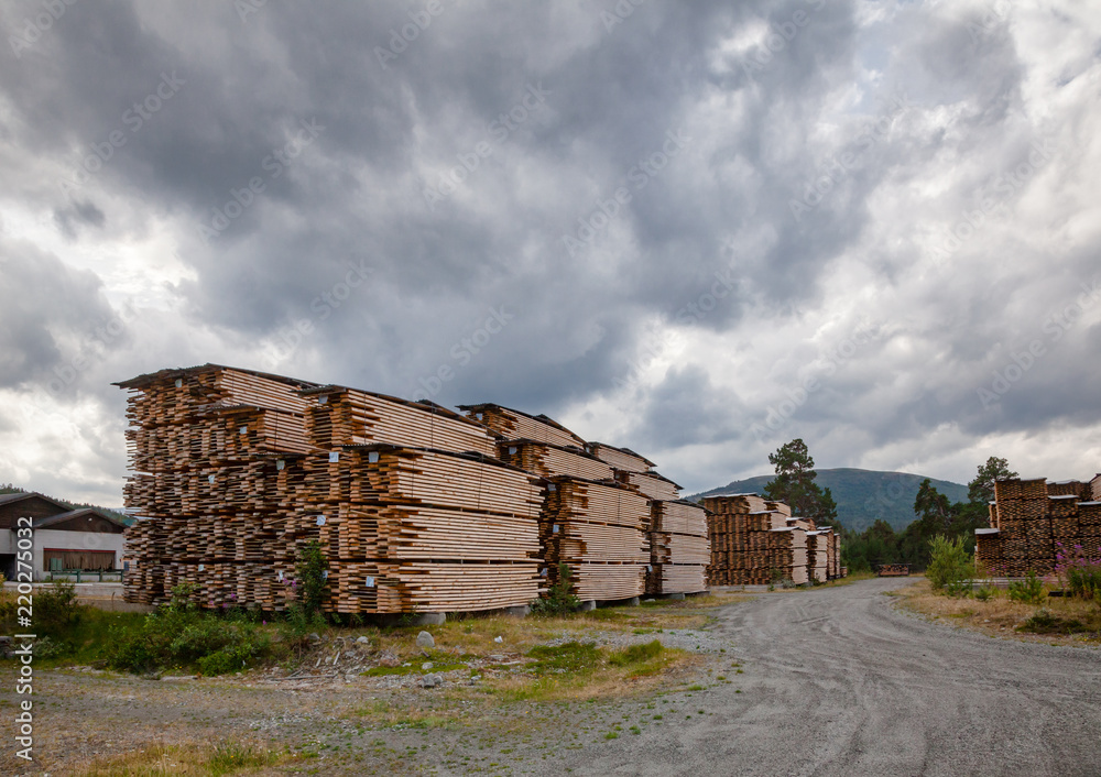 Air-drying timber stacks - wood seasoning in lumber industry Air-drying timber stacks - wood seasoning in lumber industry