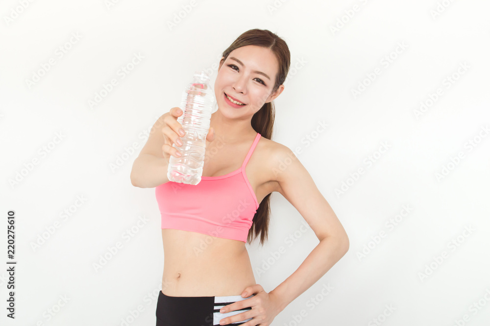 Exercise concept. Athletes are tired of exercising. Beautiful girl drinking water after exercise. Exercise concept. Athletes are tired of exercising. Beautiful girl drinking water after exercise.