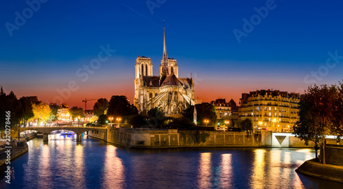 Picturesque panorama of Cathedral of Notre Dame de Paris at sunset  France