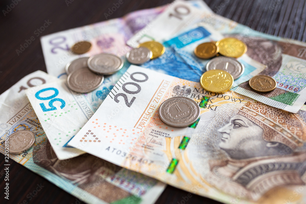 Stack of polish zloty banknotes and coins Stack of polish zloty banknotes and coins